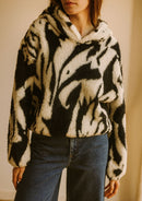 CHOMPA CAPUCHA PELUCHE