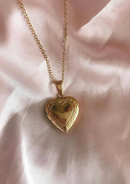 RELICARIO CORAZON CON BORDE LABRADO